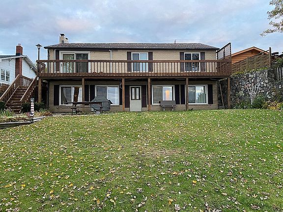 large yard before lake