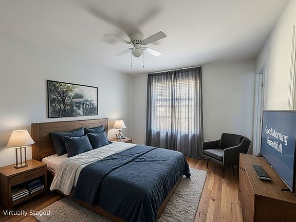 generous sized bedroom with ample space on the left side for another wardrobe closet.