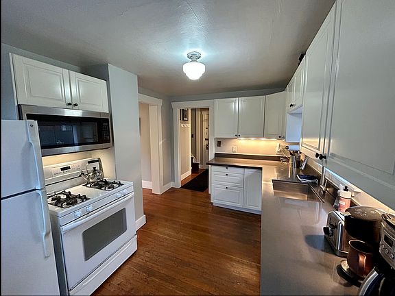 kitchen updated with gas stove, dish washer, microwave