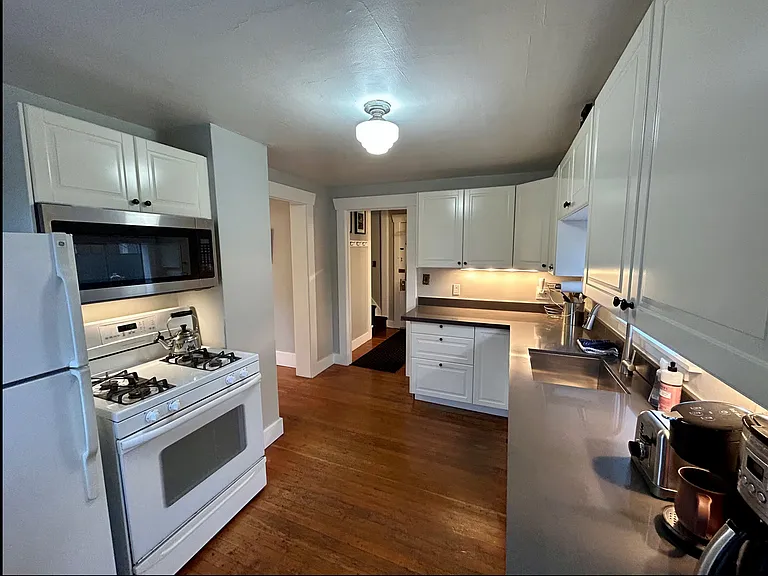 kitchen updated with gas stove, dish washer, microwave