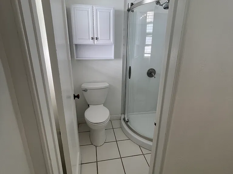 Bathroom off bedroom.