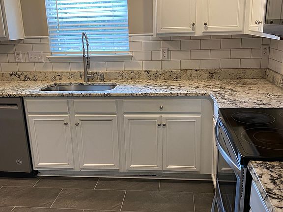 View of newly the newly remodeled kitchen taken from the formal dining room.