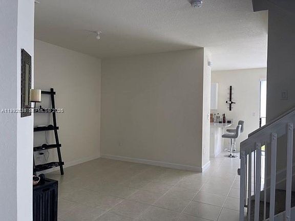 5th image of 11064 W 33rd Way #Townhouse 11064