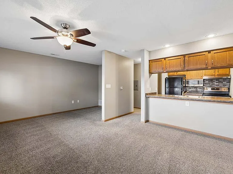 Comfortable and connected, this open living area flows effortlessly into the kitchen, creating a welcoming space for quiet evenings, casual gatherings, and everything in between.