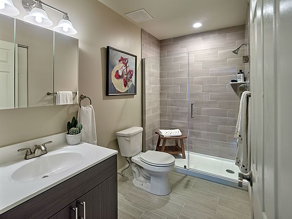 Willowyck Apartments bathroom with walk-in shower