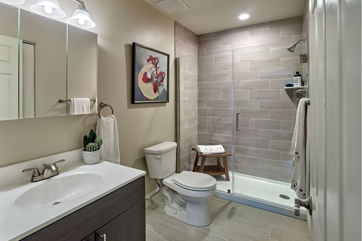 Willowyck Apartments bathroom with walk-in shower