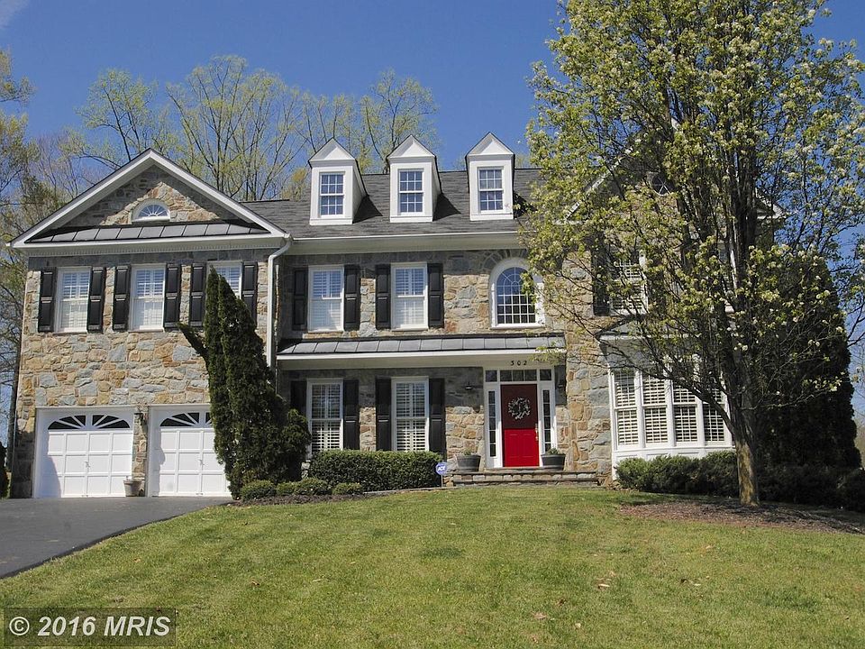 Stone front Colonial on one acre