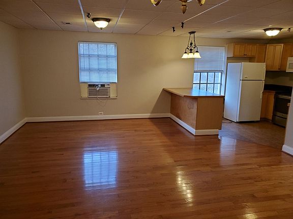 Open floor plan with eat-in bar counter space
