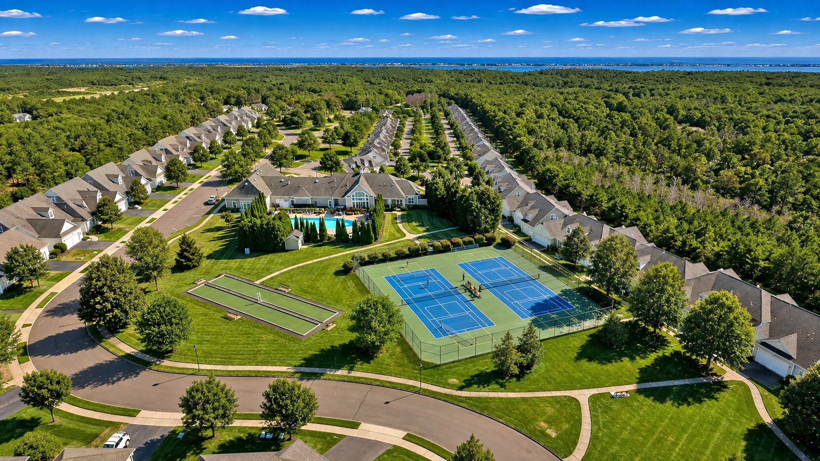  Community tennis/pickle ball court, bocce court and recreation area.