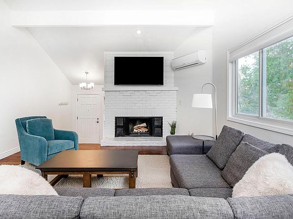 Living Room with Wood Burning Fireplace