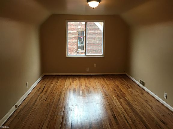Very large upstairs bedroom. Refinished floors.