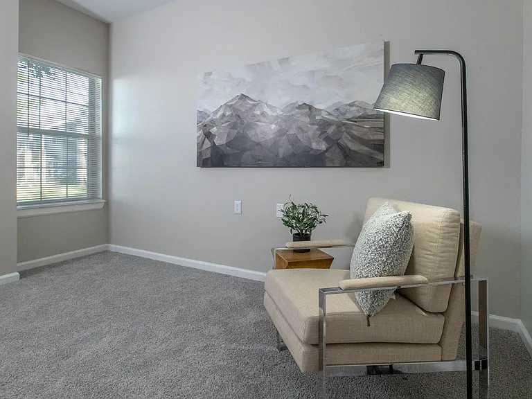 Experience bedroom tranquility with sunlit views and multi-speed ceiling fans, designed to enhance your comfort and relaxation.