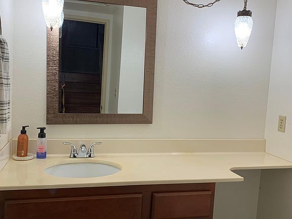 Bathroom No. 1 - Half bath next to living room for easy guest access.