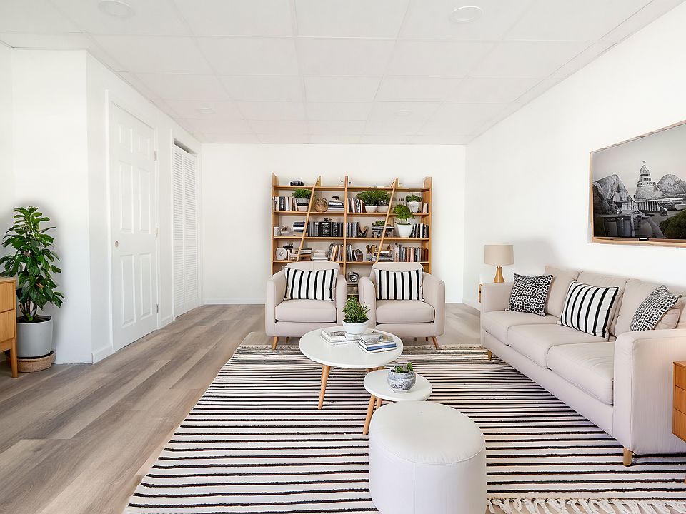 1st floor living room. Plenty of natural light, hardwood flooring, and recessed lighting.