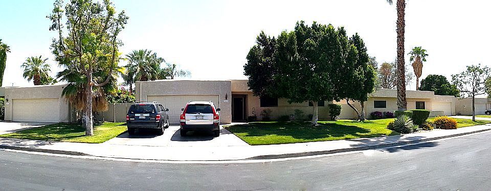 2-car garage and 2 spaces in driveway. Beautiful tree provid