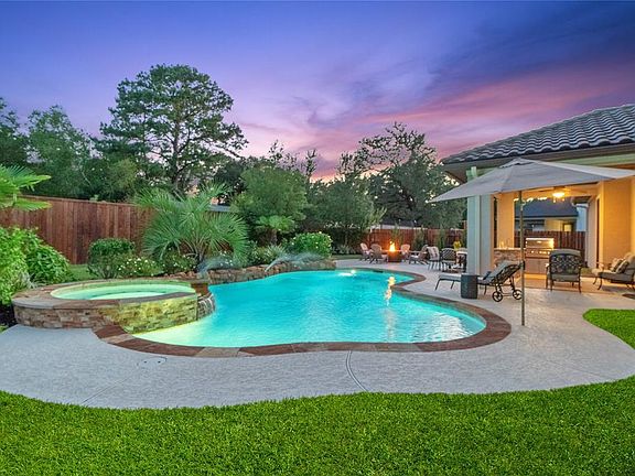 Hard to believe this resort-like paradise can be enjoyed in your very own private back yard.