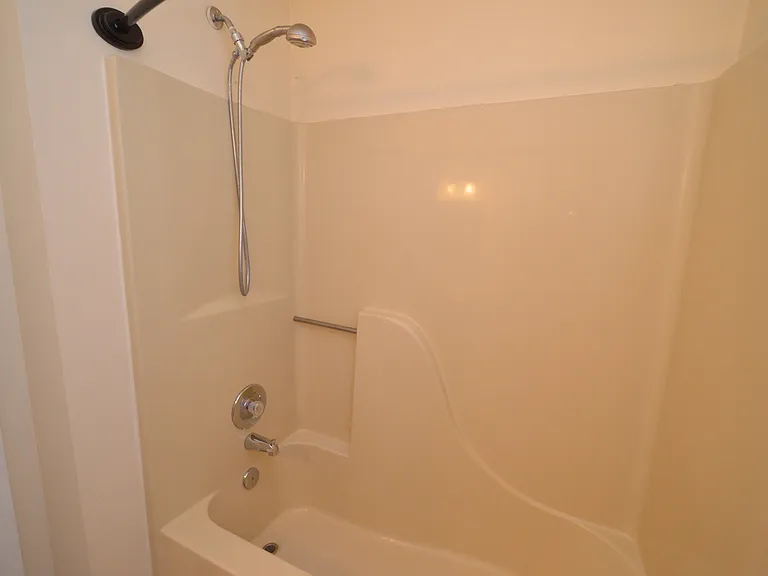 Upper level hallway shower tub