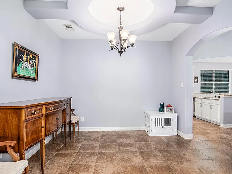 Versatile formal dining room or additional living space.