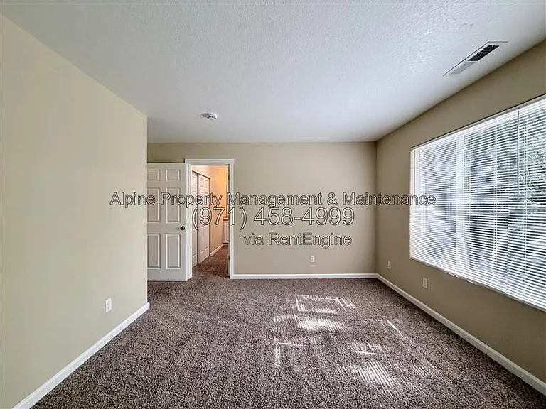 5758 NE Damsel Dr — Photo 28