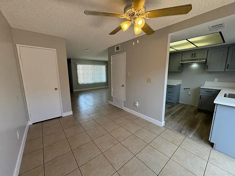 Dining area adjacent to kitchen. All has been freshly painted