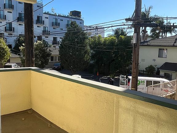 PRIVATE PATIO W/ ROOM FOR TABLES & CHAIRS