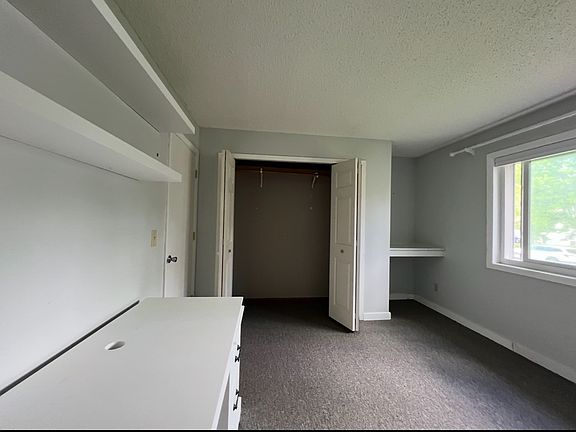 LEFT Upstairs bedrooms, has a built in vanity (hanging mirror not provided)