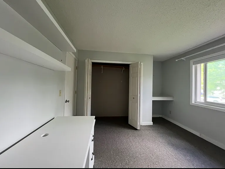 LEFT Upstairs bedrooms, has a built in vanity (hanging mirror not provided)