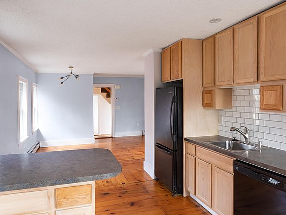Kitchen and open space for dinning or sitting area.