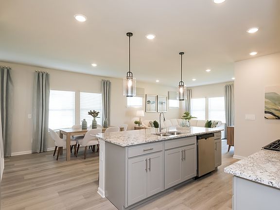 Kitchen in the Roswell floorplan at a Meritage Homes community in Atlanta, GA.