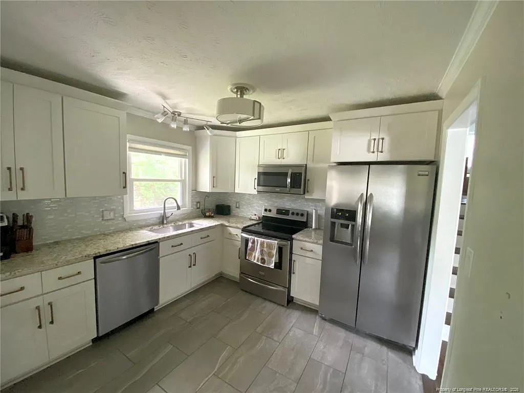 3308 Cranbrook Dr — Photo 2
