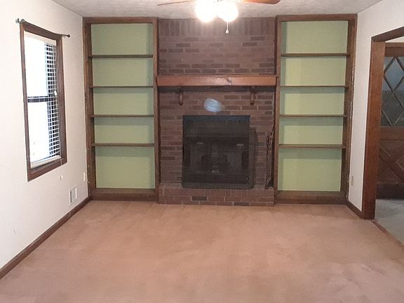 Living room, wood fireplace.