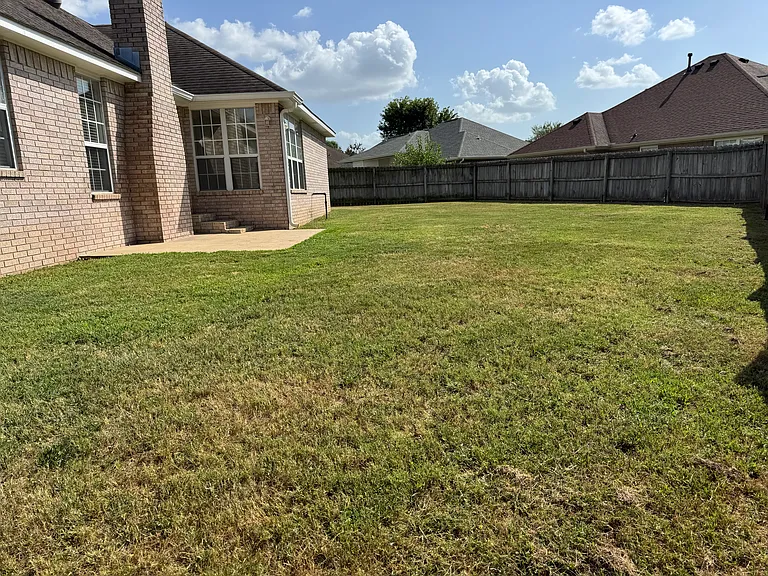 Backyard depth gives plenty of room for outdoor activities or a pet