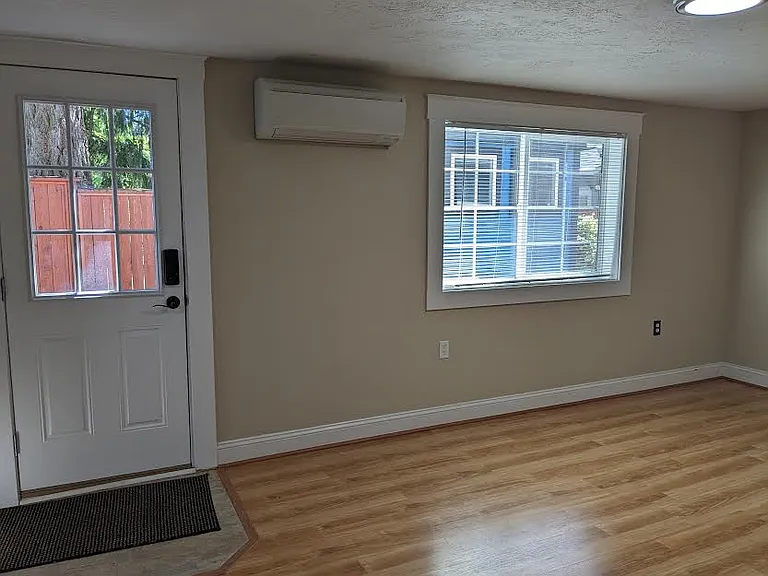 Entrance door near alley to living area.