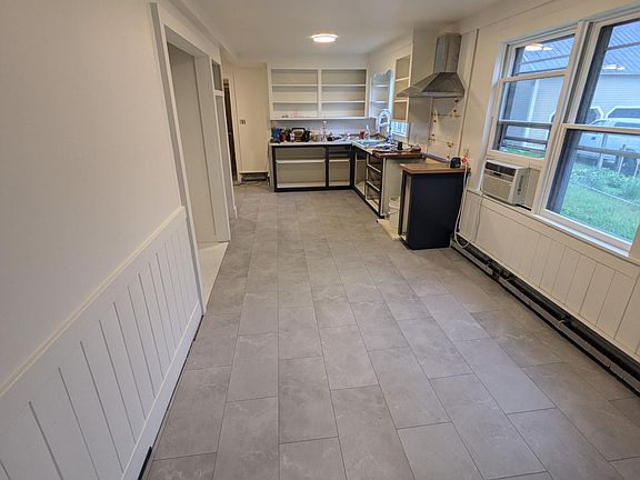 Kitchen/Dining - lanudry closet to the left. Under construction to be finished 7/15/24.