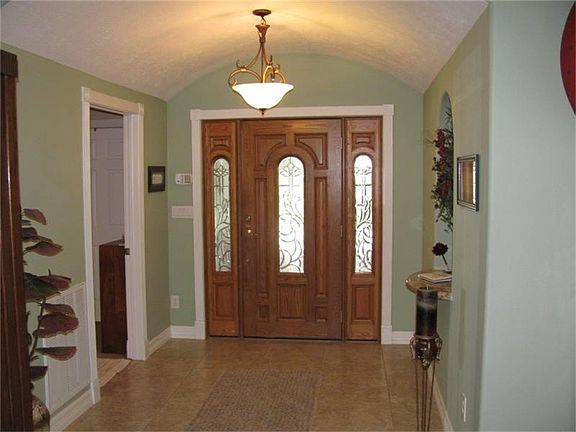 Open Entry with arched ceiling
