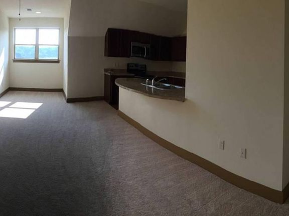 Front door looking into shared common space - living room/ki