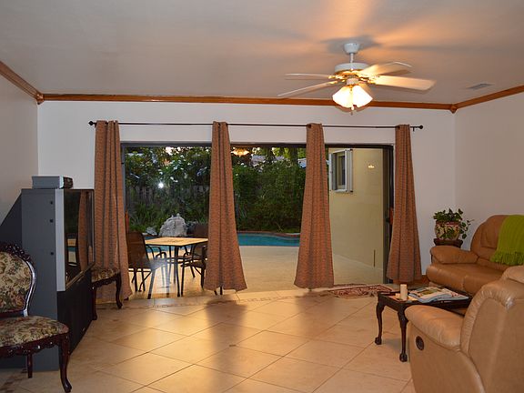 living rm with view of pool