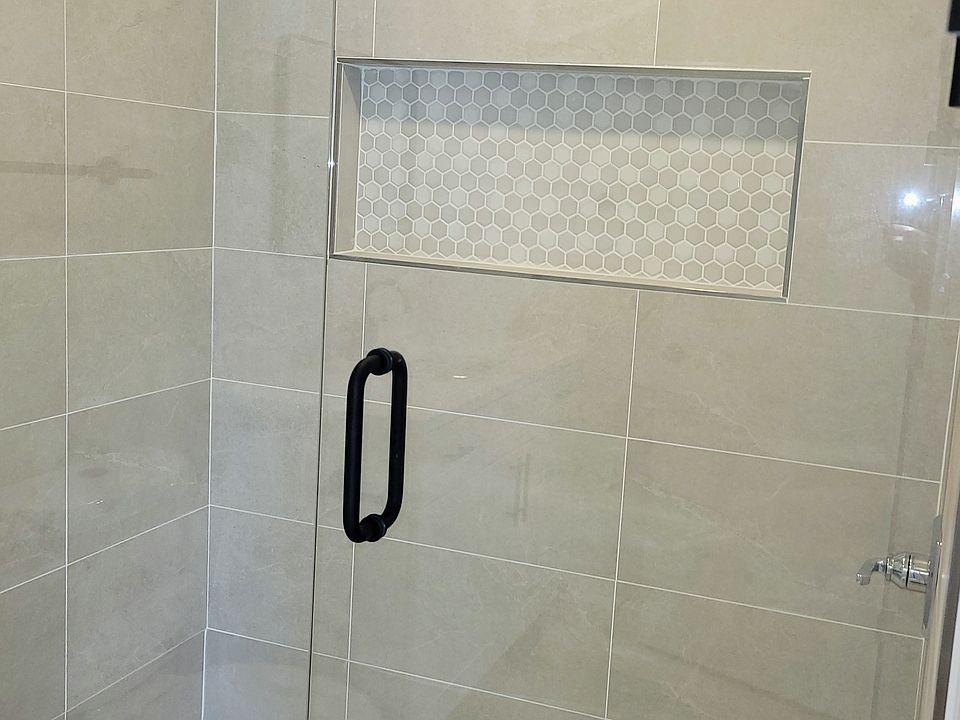 Oversized luxury master shower with seamless glass