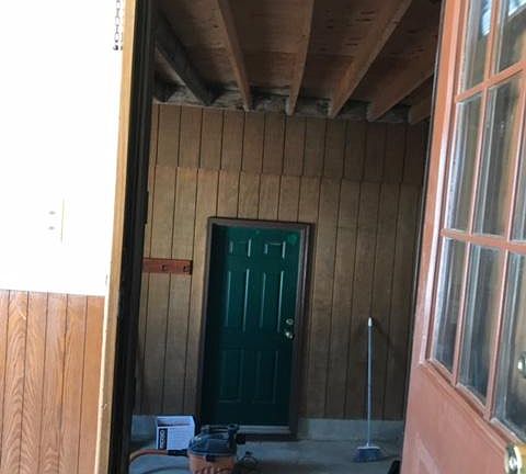 Exit from laundry room through breezeway to and from garage. Also a storage area.