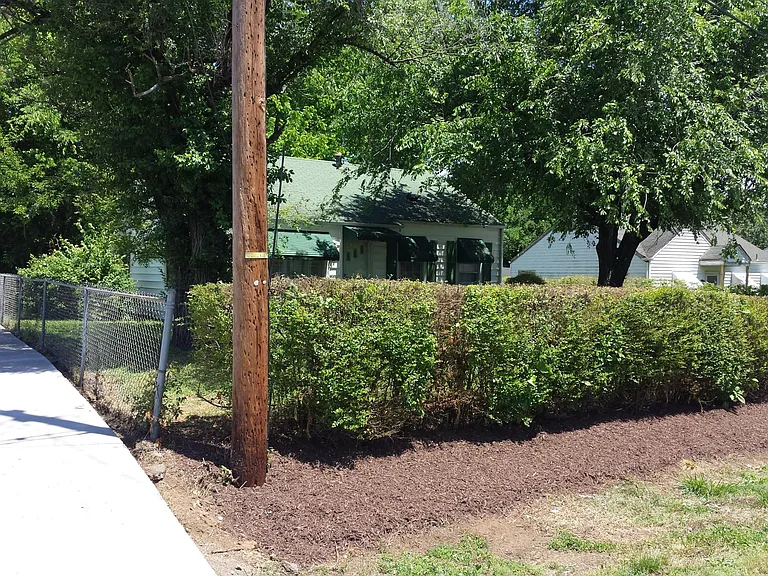 VERY private hedge around the front yard. Fully fenced in for Dogs.