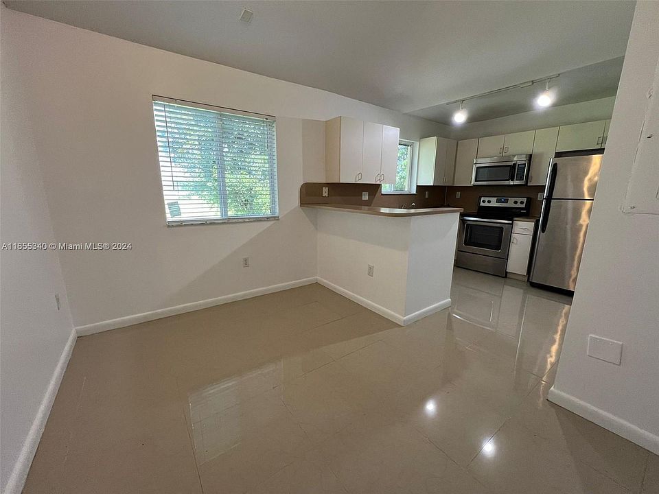 1st image of 990 NE 33rd Ter Unit 203