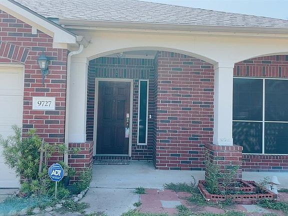 4th image of 9727 Woody Oaks Dr