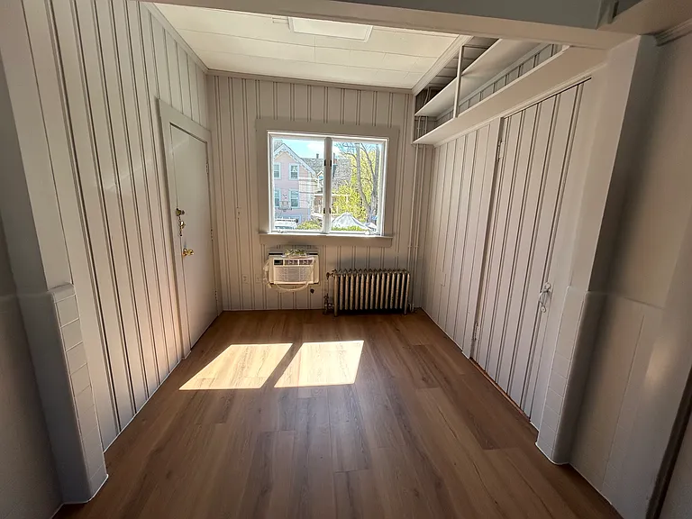 Kitchen with two storage closets in this area 
Eat in table area