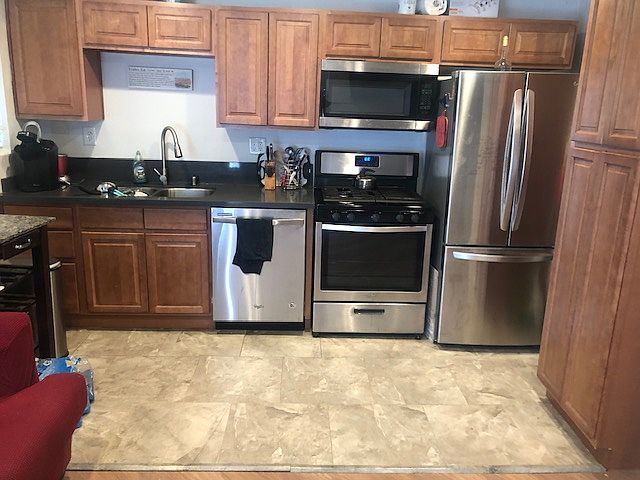 Updated full kitchen, dishwasher, fridge with ice maker, full size gas stove, microwave, air fryer, crock pot, Keurig.