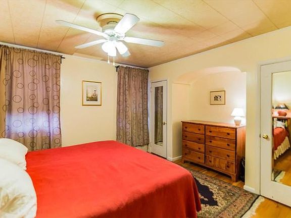 Warm and cozy bedroom with two closests.