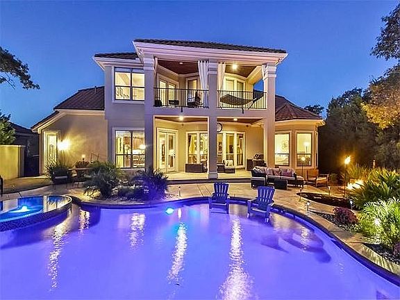 Large pool with hot tub and ample areas to entertain.