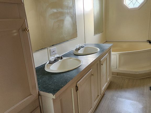 Master Bath, includes garden tub and separate shower.