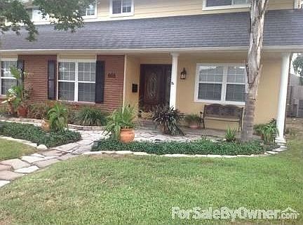 Front view
						:
						Well maintained and manicured landscaping in front and back