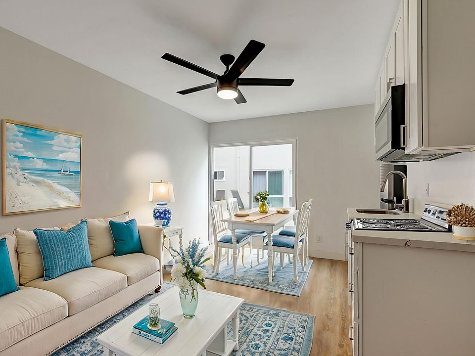 *Living / Dining Room*
This photo is a sample of our beautifully updated 1st floor Pool View unit ( 1 available in December) with the same bright, modern finishes. (All units are unfurnished)