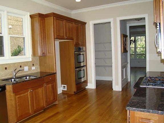 Custom Cabinetry and Beautiful Hardwoods. Graninte Countertops